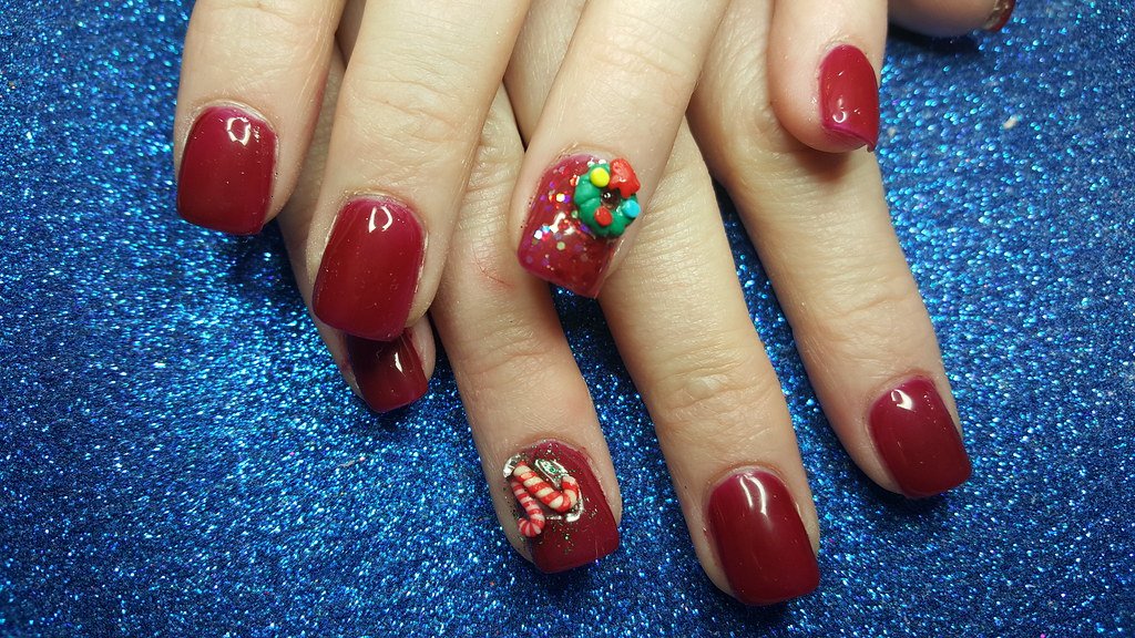 Acrylic nails with red gel polish
