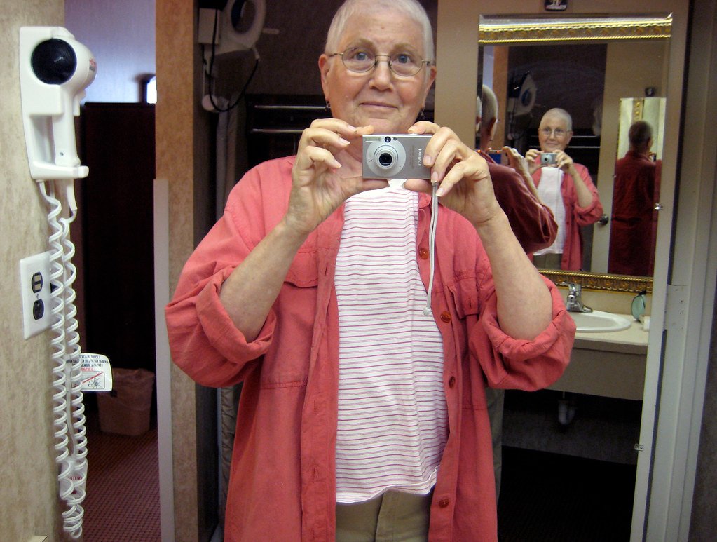 quadruple self-portrait with hair dryer