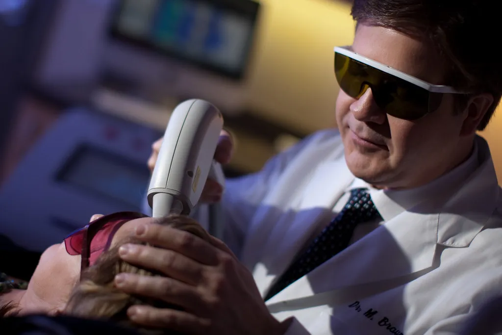 Dr Braun Performing Laser Hair Removal