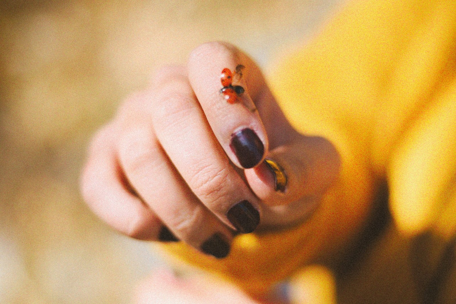 person with black nail polish