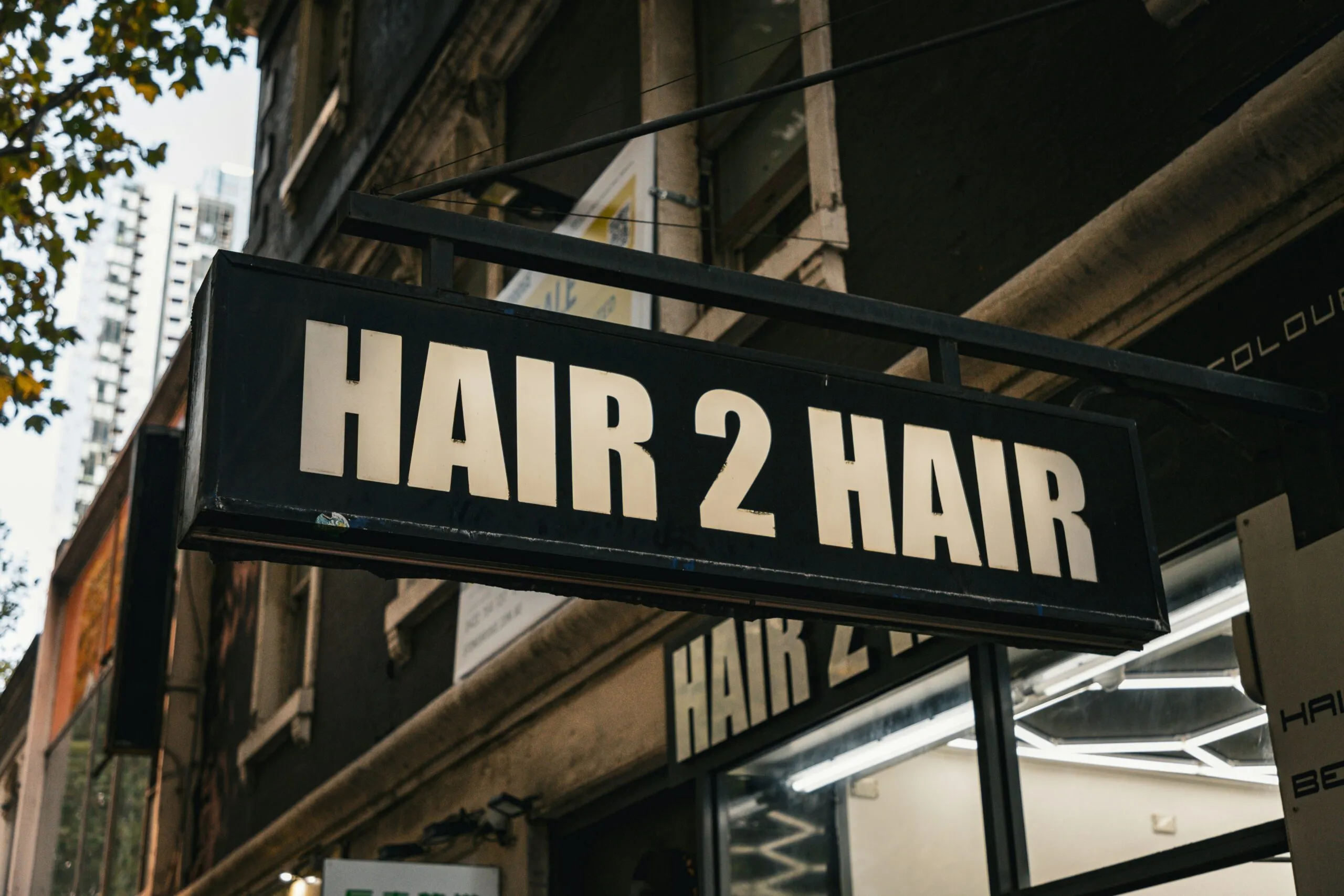 Hair 2 hair salon sign is displayed.