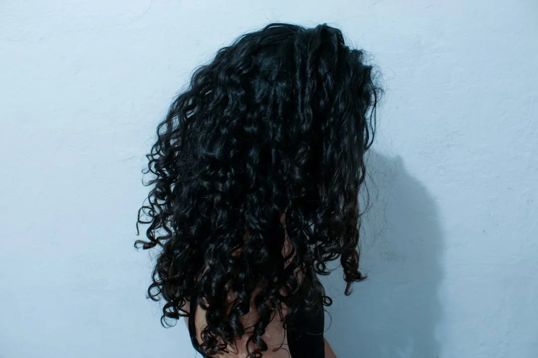 a person with the hair pulled back