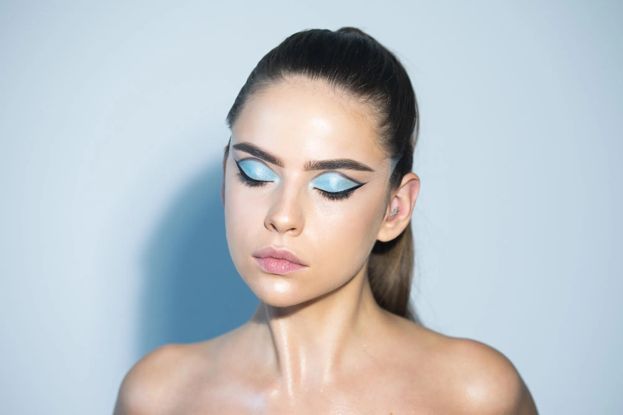 Eye shadow visagiste cosmetics of young beauty model girl fashion girl make up cosmetology beauty an