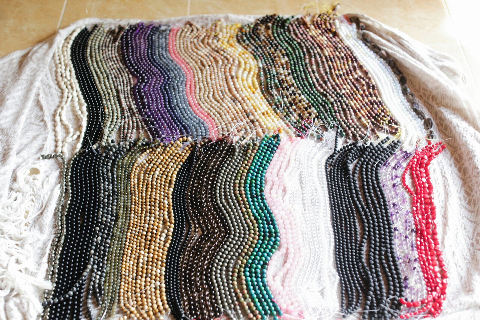 a pile of beads sitting on top of a table