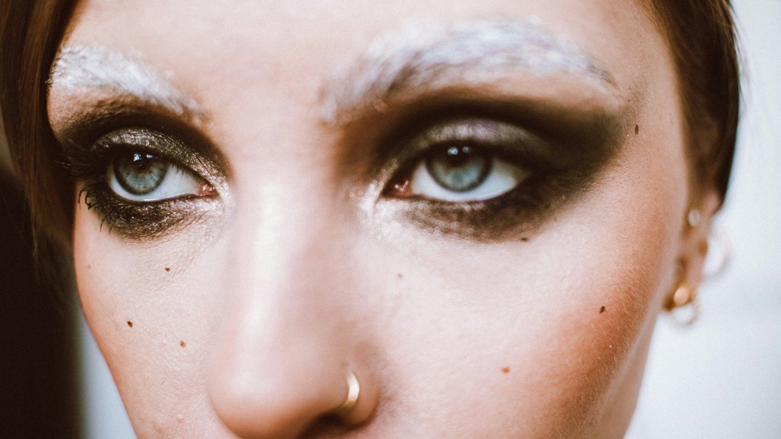 a close up of a woman's face