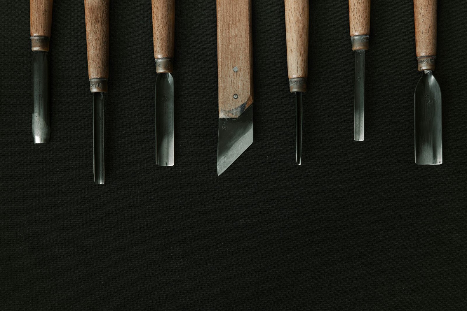 brown and black kitchen knife and fork