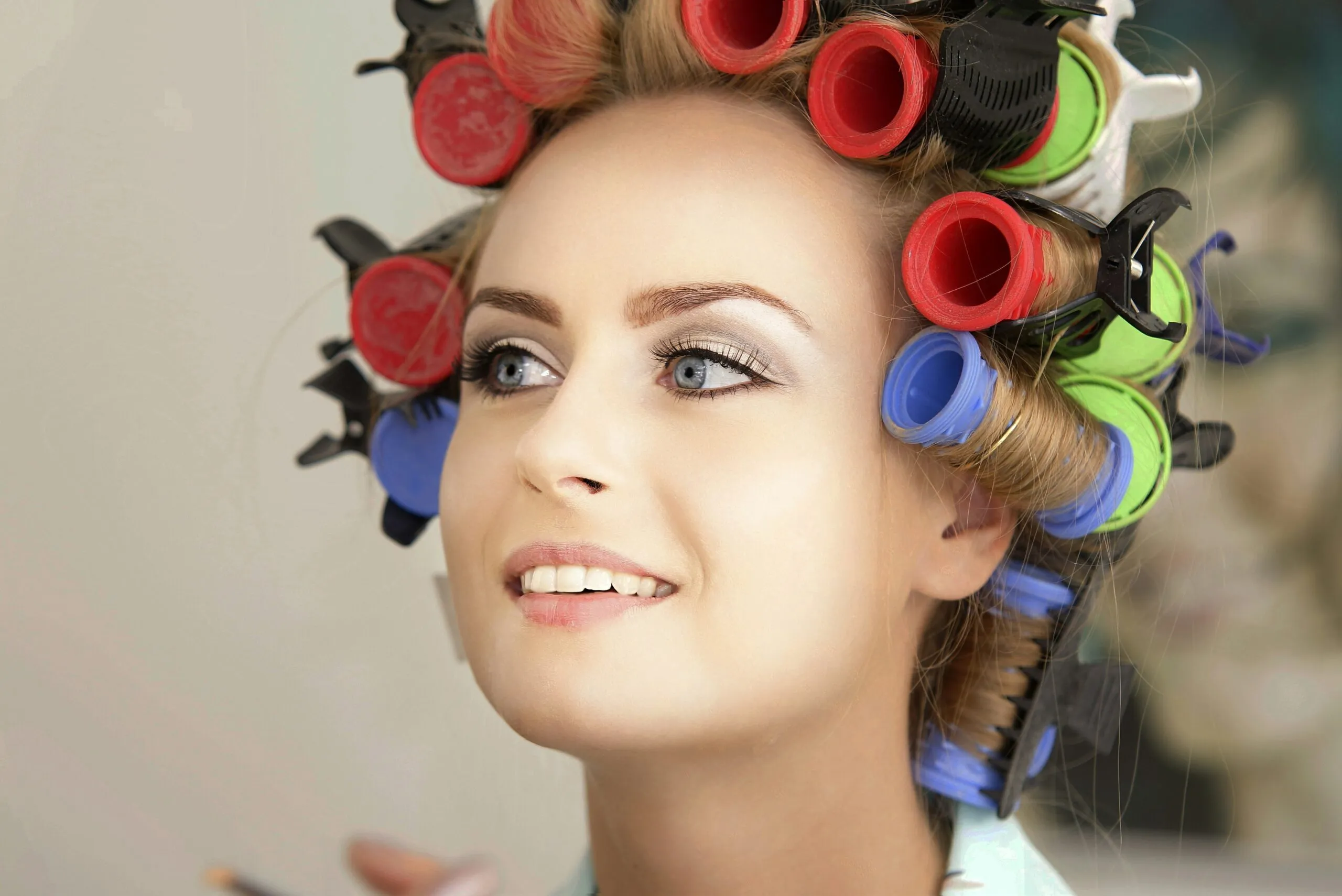 woman with red and blue hair clip