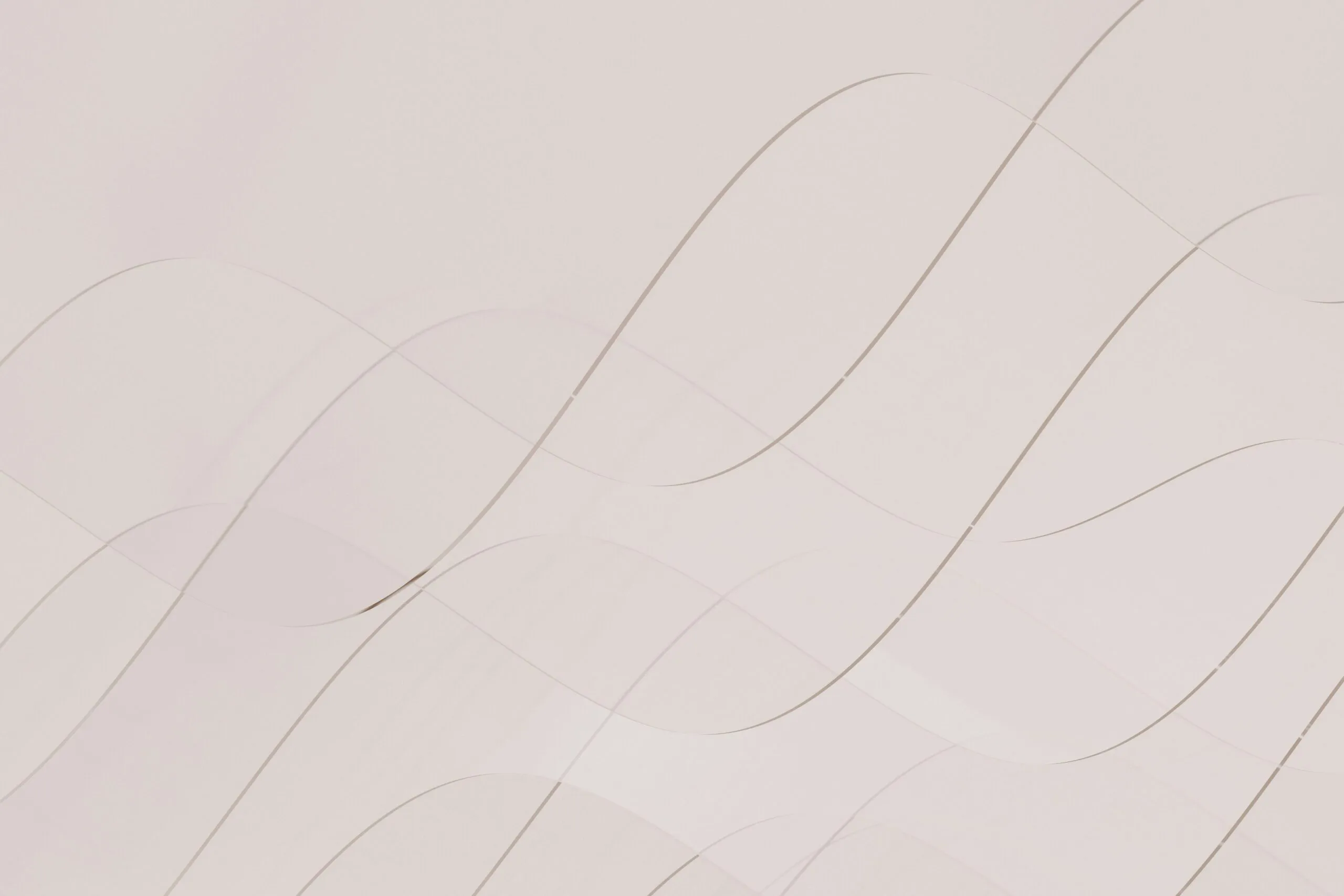 A white wall with wavy lines on it