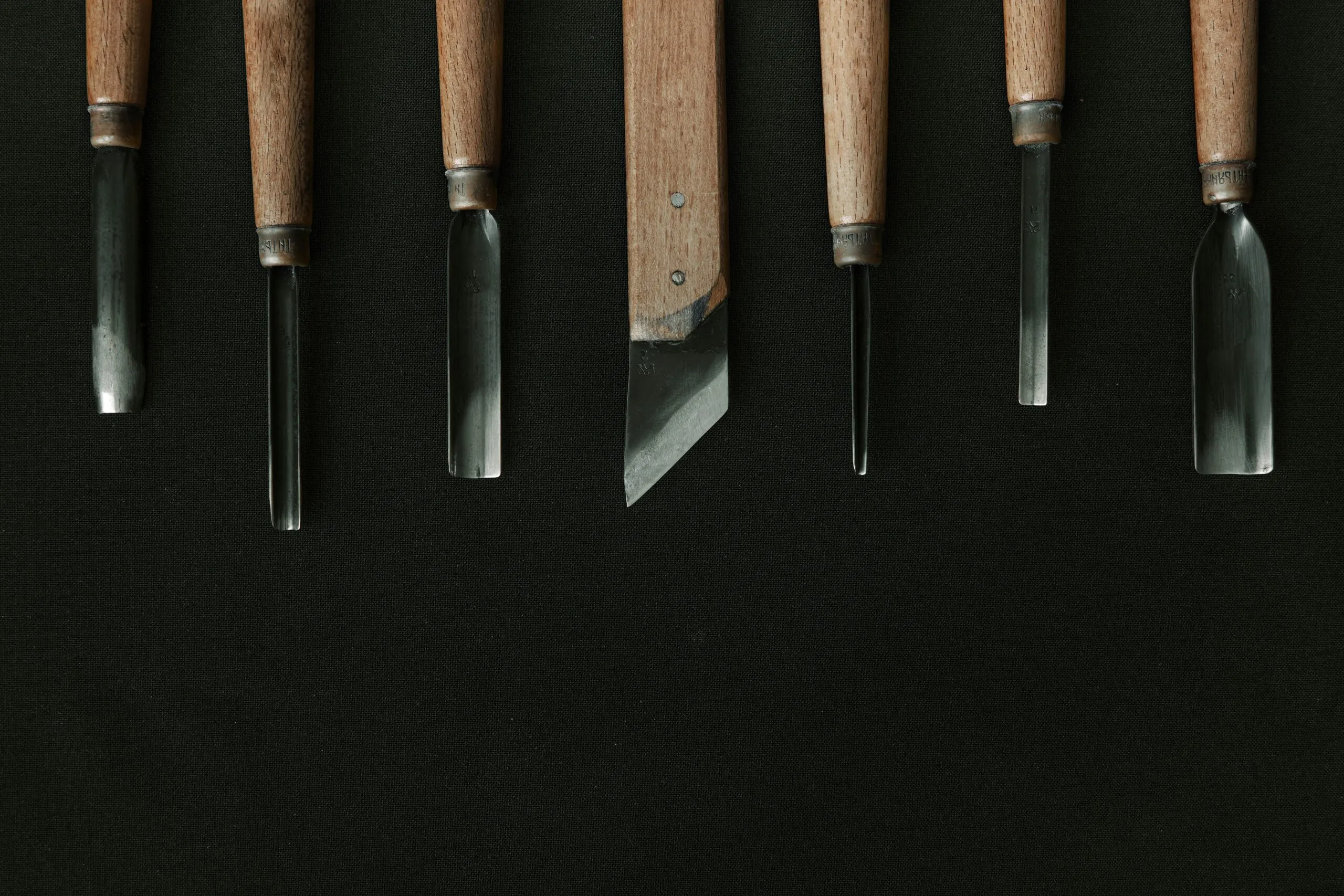 brown and black kitchen knife and fork