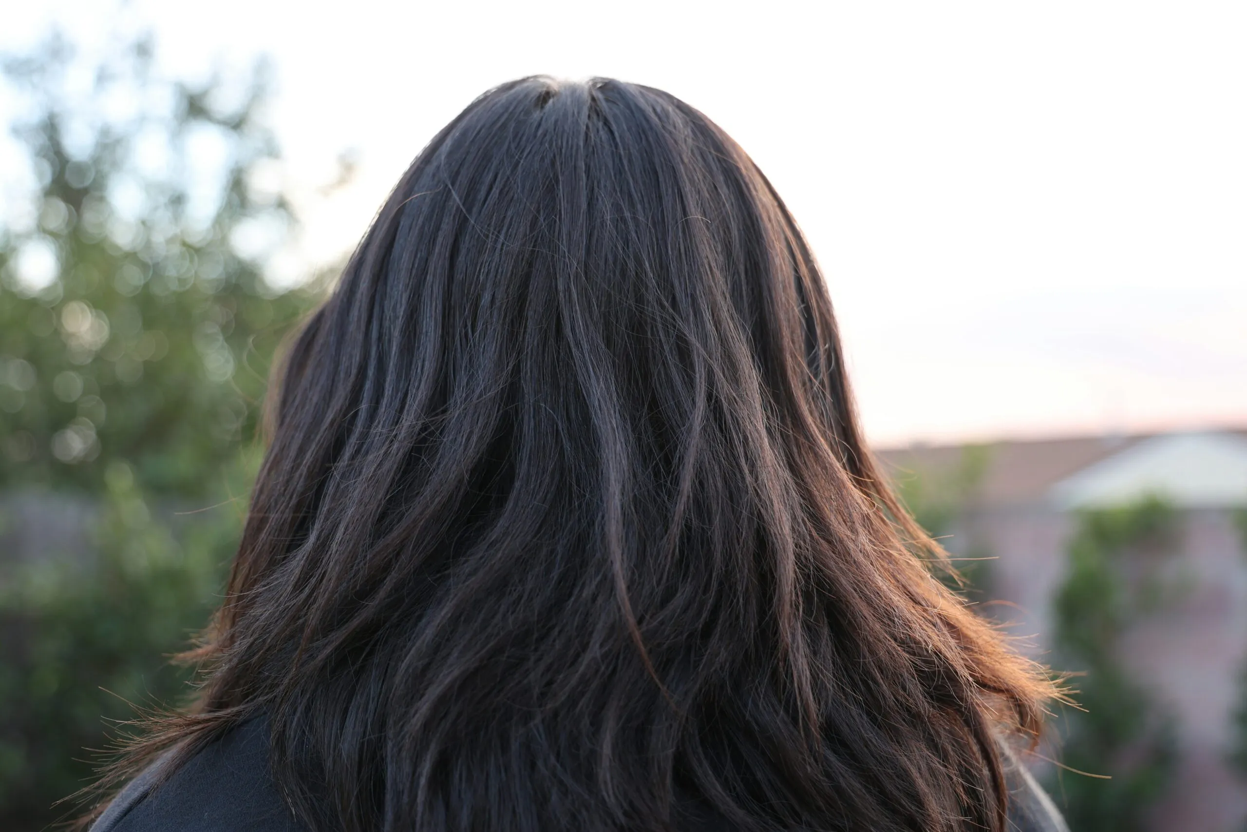 a close up of a person with long hair