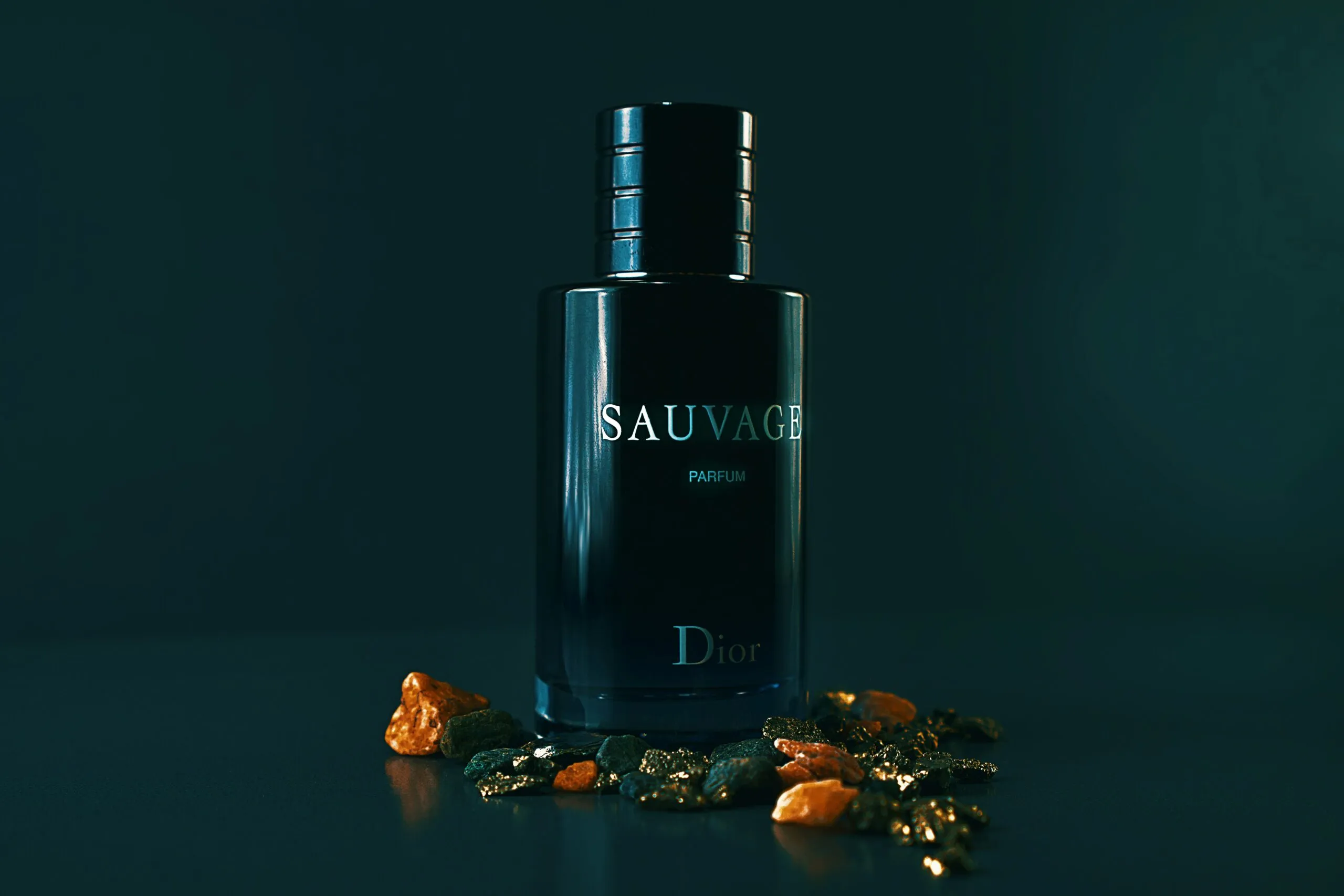 A bottle of cologne sitting on top of a table