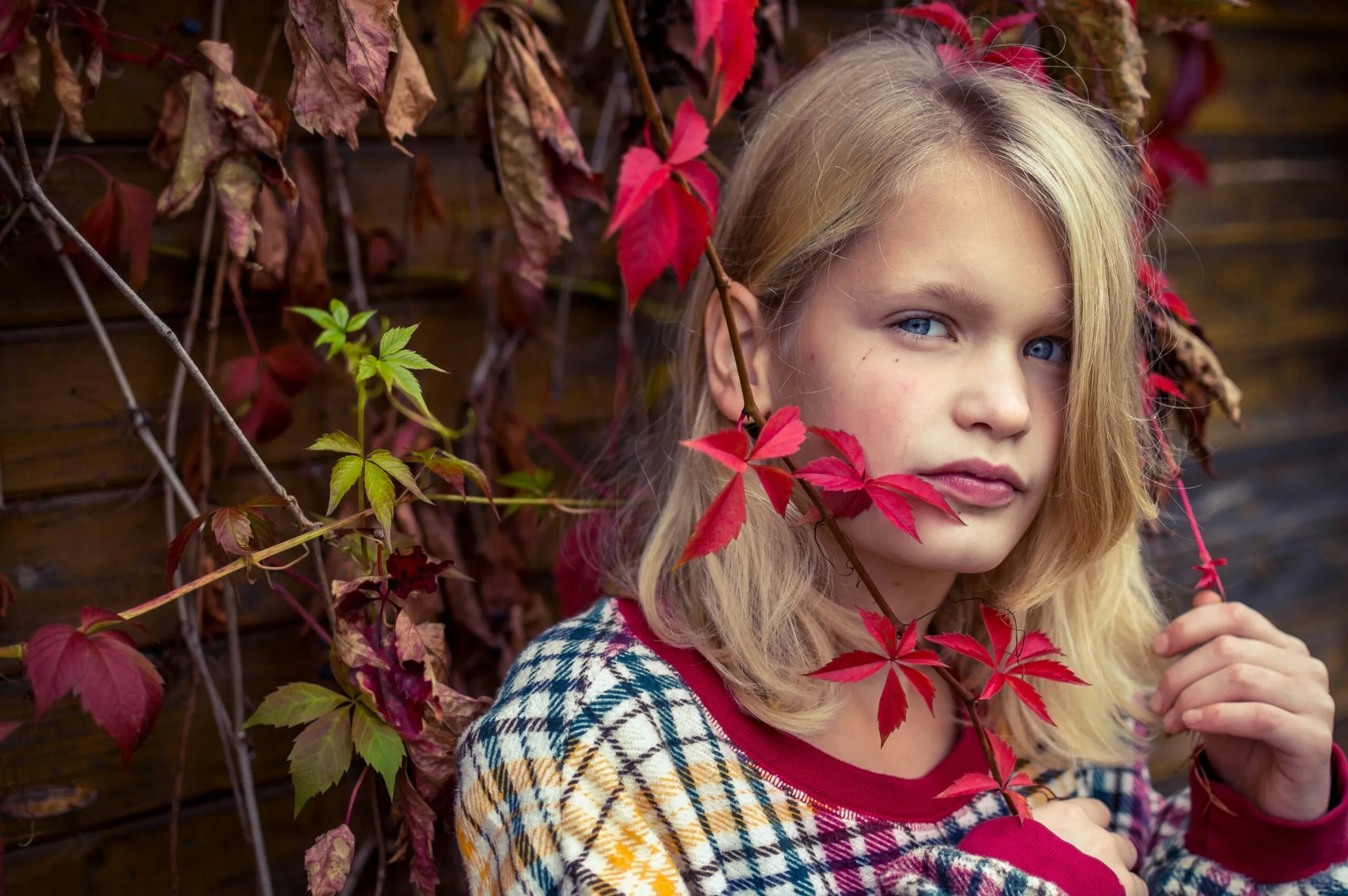 girl in red white and blue plaid shirt