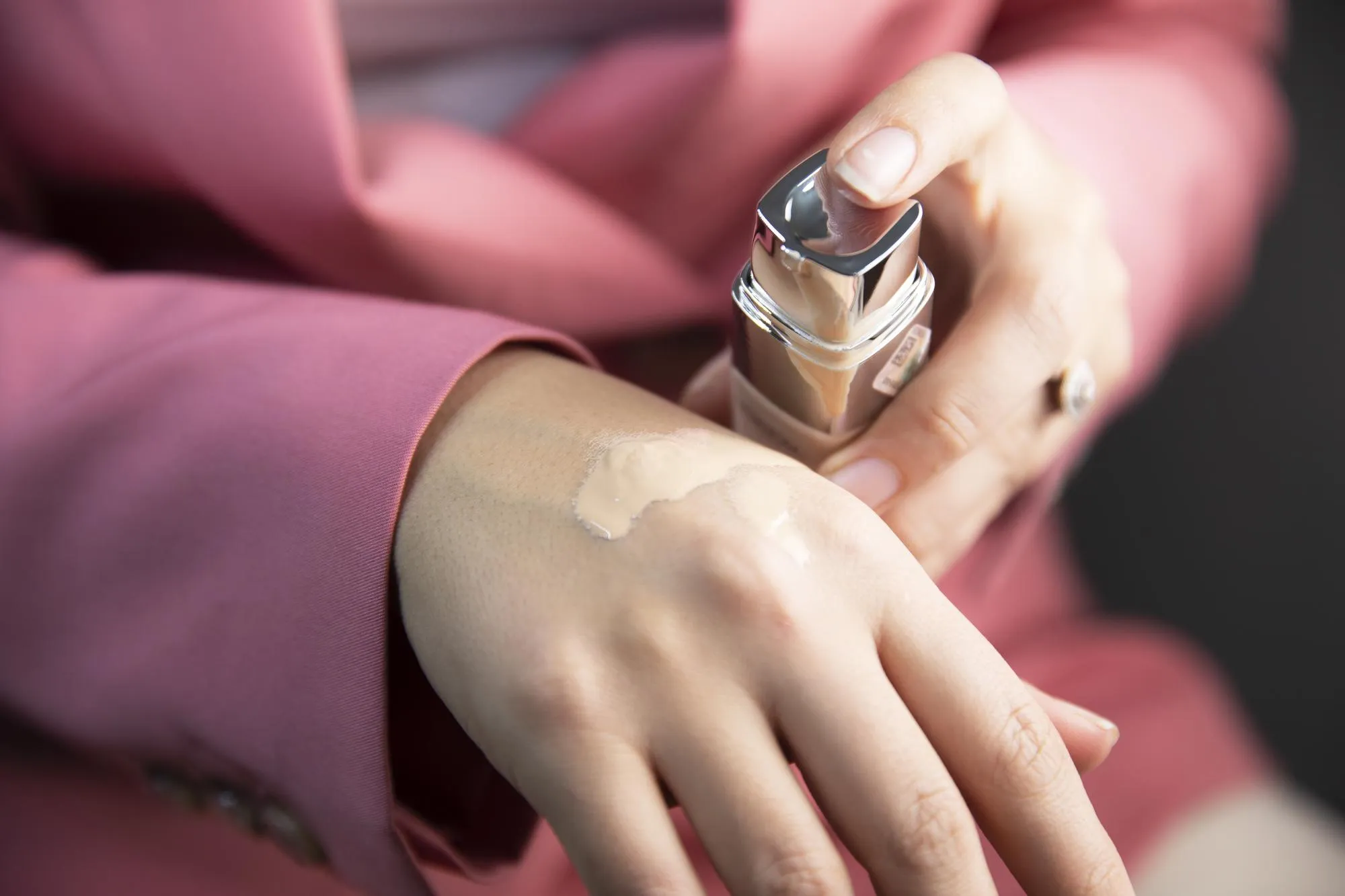 Woman testing tonal cream