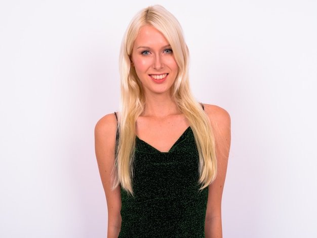young beautiful blonde woman as fashion model against white space