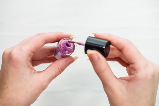 Close-up of hand holding ice cream