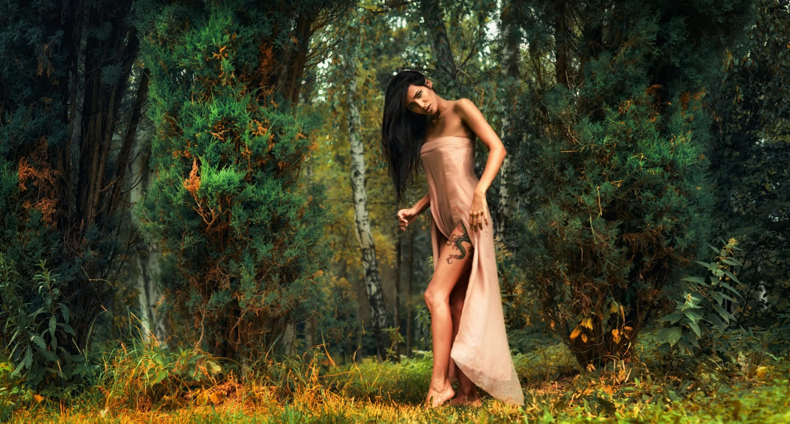 woman wearing pink strapless dress